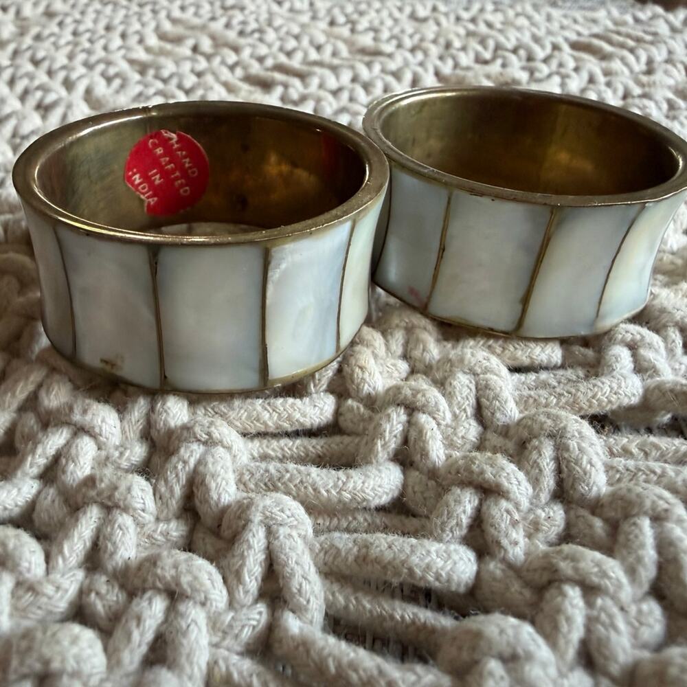 Two brass and (abalone) mother of pearl napkin rings